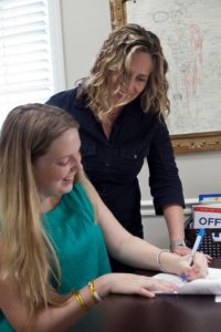 Ashlee Grove works with high school student on ACT Test Prep 